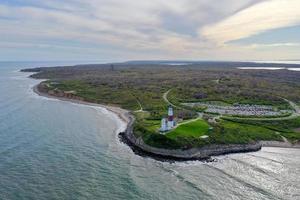 Aerial view of the Montauk Lighthouse and beach in Long Island, New York, USA. photo