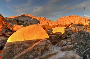 Barker Dam in Joshua Tree National Park in the evening at sunset. photo