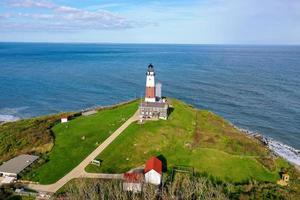 Aerial view of the Montauk Lighthouse and beach in Long Island, New York, USA. photo