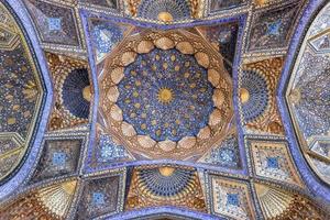 Samarkand, Uzbekistan - Jul 10, 2019 -  Gur-Emir Mausoleum of Tamerlane and his family in Samarkand, Uzbekistan. The building complex dates from the 15th century. photo