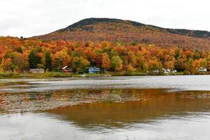 Overlooking of Lake Elmore State Part With Beautiful Autumn Foliage and Water reflections at Elmore, Vermont, USA photo