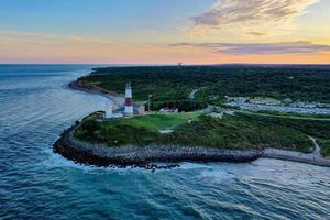 Aerial view of Montauk Lighthouse and beach in Long Island, New York, USA. photo