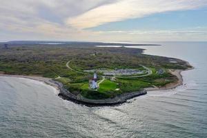 Aerial view of the Montauk Lighthouse and beach in Long Island, New York, USA. photo