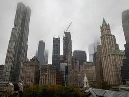 View of downtown Manhattan Skyline on a cloudy day in New York City. photo