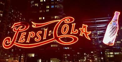 New York City - January 2, 2016 -  PepsiCola sign and Queensboro Bridge at night as seen from Gantry Plaza, Long Island. photo