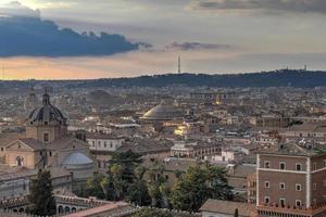 Aerial view of the skyline of the Pantheon in Rome, Italy as sunset approaches. photo