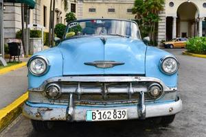 Havana, Cuba - Jan 14, 2017 -  Classic Car Taxi in front of the Hotel Nacional in Havana, Cuba. photo