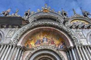 Saint Marks Square in Venice Italy. It is the principal public square of Venice, Italy, where it is generally known just as la Piazza photo