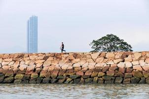 Fisherman and Hong Kong Skyline photo