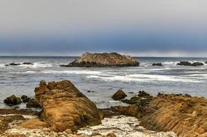 Bird Rock is one of the most popular stops along the 17-Mile Drive. There are hundreds of birds, harbor seals and sea lions there. photo