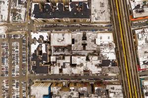 Aerial view of a snow covered roofs of buildings in Brighton Beach during the winter in Brooklyn, New York photo