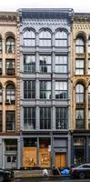 New York City, New York - June 11, 2020 -  Store closed during the COVID-19 pandemic, with boarded up windows to protect against looting as a result of anti-police brutality protests. photo