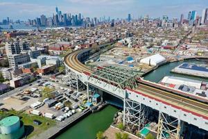 Panoramic view of the Gowanus Canal in Brooklyn with the Gowanus Expressway and Manhattan in the background. photo