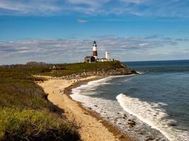 Montauk Lighthouse and beach in Long Island, New York, USA. photo