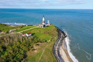 Aerial view of the Montauk Lighthouse and beach in Long Island, New York, USA. photo