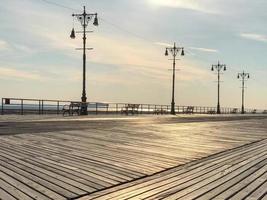 Boardwalk in Coney Island on a sunny winter day photo