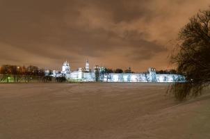 Russian orthodox churches in Novodevichy Convent monastery, Moscow, Russia, UNESCO world heritage site at night during winter. photo