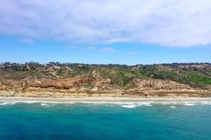Aerial view along the Pacific Ocean of La Jolla Beach and Torrey Pines in San Diego, California. photo