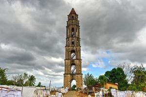 Historic slave watch tower in Manaca Iznaga, Valle de los Ingenios, Trinidad, Cuba. The Manaca Iznaga Tower is the tallest lookout tower ever built in the Caribbean sugar region. photo