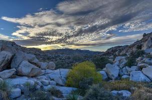 Barker Dam in Joshua Tree National Park in the evening at sunset. photo