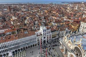 Aerial view of Saint Mark's Square in Venice Italy. It is the principal public square of Venice, Italy, where it is generally known just as la Piazza photo