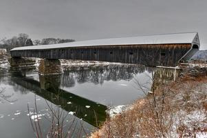 The Cornish-Windsor Covered Bridge. It connects Vermont and New Hampshire at their borders. It is the world's longest covered bridge at 460 feet. It was built in 1866. photo