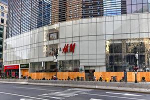 New York City, New York - June 11, 2020 -  Store closed during the COVID-19 pandemic, with boarded up windows to protect against looting as a result of anti-police brutality protests. photo