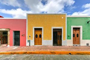 Bright colors in colonial houses on a sunny day in Campeche, Mexico. photo