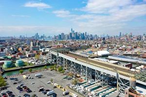 Panoramic view of the Gowanus Canal in Brooklyn with the Gowanus Expressway and Manhattan in the background. photo