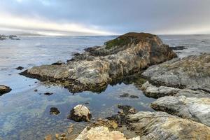 Landscape of Sunset Point along 17 Mile Drive in the coast of Pebble Beach, California photo