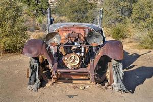 Abandoned equipment and mine along Wall Street Mill Trail in Joshua Tree National Park, California. photo