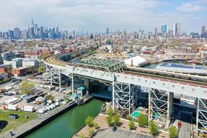 Panoramic view of the Gowanus Canal in Brooklyn with the Gowanus Expressway and Manhattan in the background. photo