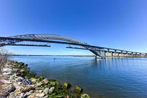 The Bayonne Bridge from Staten Island, New York. The Bayonne Bridge is the 5th longest steel arch bridge in the world, spans the Kill Van Kull and connects Bayonne, NJ with Staten Island, NY. photo