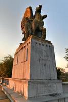 Arts of Peace, bronze, fire-gilded statue groups on Lincoln Memorial Circle in West Potomac Park at sunset in Washington, DC photo