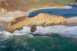 Ocean fog rolling in onto Highway 1 and Big Sur, California, USA photo