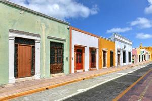 Bright colors in colonial houses on a sunny day in Campeche, Mexico. photo