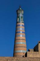 The architecture of the old city's madrassa and Islam Khoja Minaret. photo