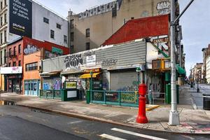 New York City, New York - June 11, 2020 -  Store closed during the COVID-19 pandemic, with boarded up windows to protect against looting as a result of anti-police brutality protests. photo