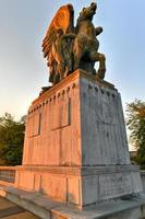 Arts of Peace, bronze, fire-gilded statue groups on Lincoln Memorial Circle in West Potomac Park at sunset in Washington, DC photo