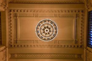 New York City - December 28, 2015 -  Beaux-Arts style waiting hall decorated with chandeliers in Grand Central Terminal in New York City. photo