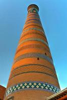 The architecture of the old city's madrassa and Islam Khoja Minaret. photo