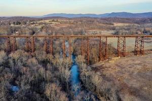 Moodna Viaduct Trestle. The Moodna Viaduct is an iron railroad trestle spanning Moodna Creek and its valley at the north end of Schunemunk Mountain in Cornwall, New York. photo