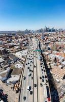 Panoramic view of the Gowanus Expressway in Brooklyn, New York with the Manhattan skyline in the background. photo