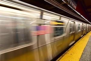 New York City - February 16, 2016 -  Passing train at the MTA 34th Street Subway Station, Herald Square in New York City. photo