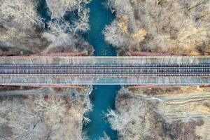 Moodna Viaduct Trestle. The Moodna Viaduct is an iron railroad trestle spanning Moodna Creek and its valley at the north end of Schunemunk Mountain in Cornwall, New York. photo