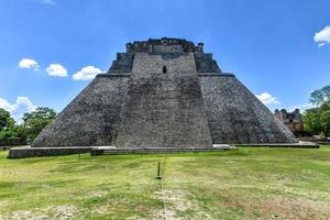 The Pyramid of the Magician at Uxmal, Yucatan, Mexico. It is the tallest and most recognizable structure in Uxmal. photo