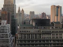 Downtown New York City aerial skyline in the evening towards sunset. photo