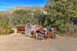 Abandoned equipment and mine along Wall Street Mill Trail in Joshua Tree National Park, California. photo