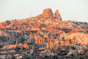 Goreme village, Turkey at sunrise. Rural Cappadocia landscape. Stone houses in Goreme, Cappadocia. Countryside lifestyle. photo