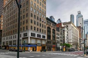 New York City, New York - June 11, 2020 -  Store closed during the COVID-19 pandemic, with boarded up windows to protect against looting as a result of anti-police brutality protests. photo